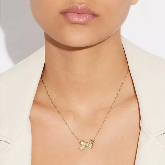 NWT COACH® Pave Bow Pendant Necklace, Adjustable 16" - 18" (L), Rainbow Colored - Picture 1 of 5